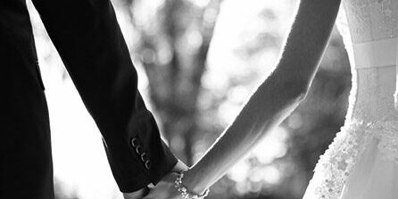 Couple holding hands