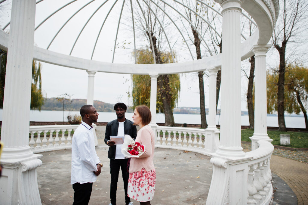 Wedding engagement ceremony with pastor